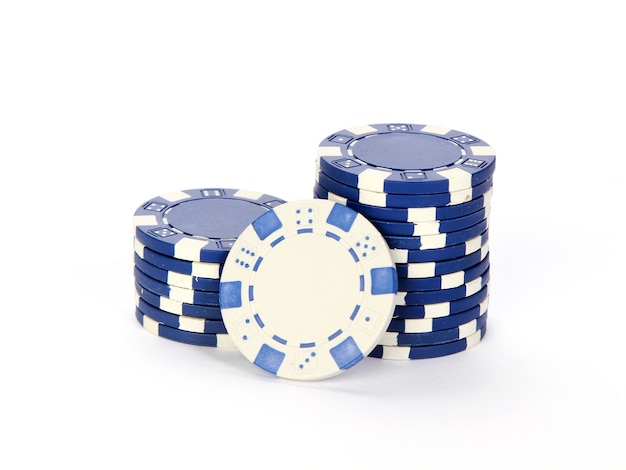 Poker chips stacked on each other isolated on a white background