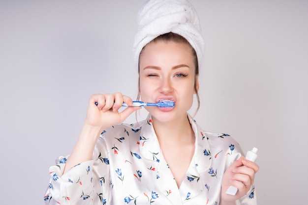 Poking girl while washing her teeth