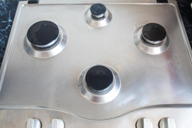 Polished gas cooker after washingPerfectly clean gas cooker after being washed with polishing chemicals The result of washing the burners