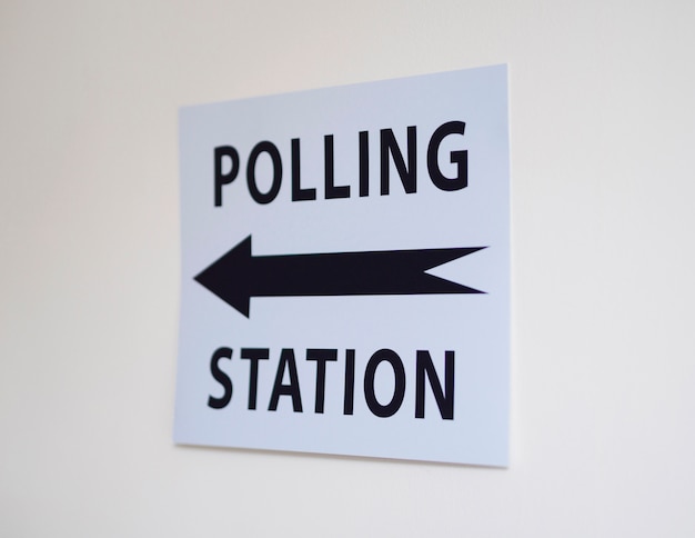 Polling station sign with direction