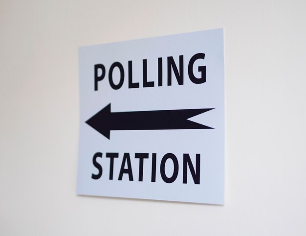 Polling station sign with direction