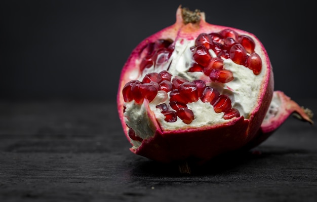 pomegranate on a black background