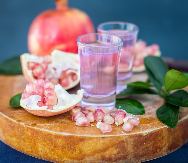 Pomegranate drink from the garnet grains selective focus