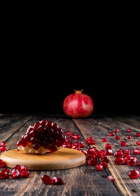 Pomegranate on wooden table