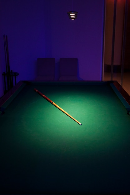 Pool table with a stick