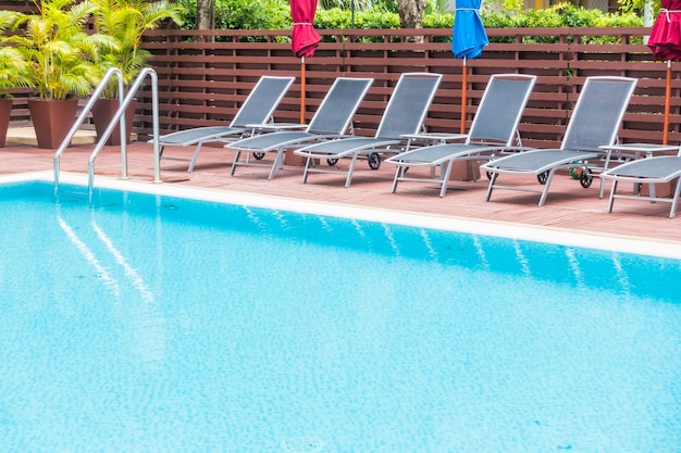 Pool with hammocks arranged in row