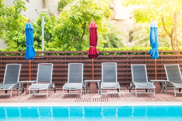 Pool with hammocks arranged in row