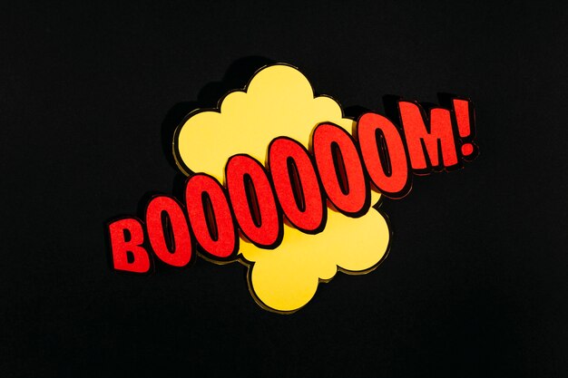 Pop art style sound effects comics text boom on black background