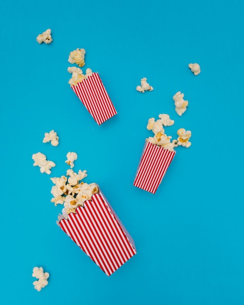 Popcorn composition on blue background