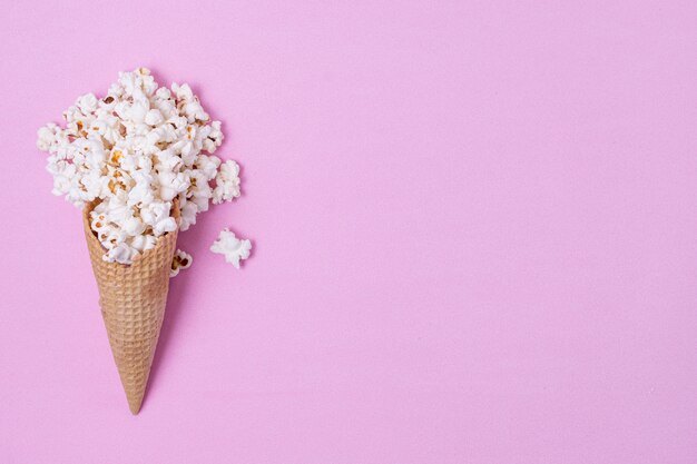 Popcorn in ice cream cone with copy space