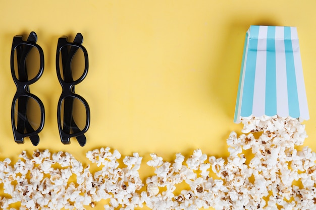 Popcorn line near box and glasses