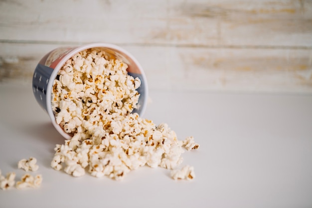 Free photo popcorn spilled from bucket