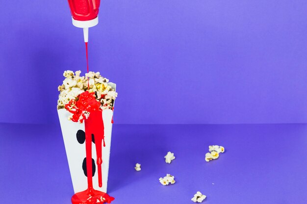 Popcorn with blood-like sauсe