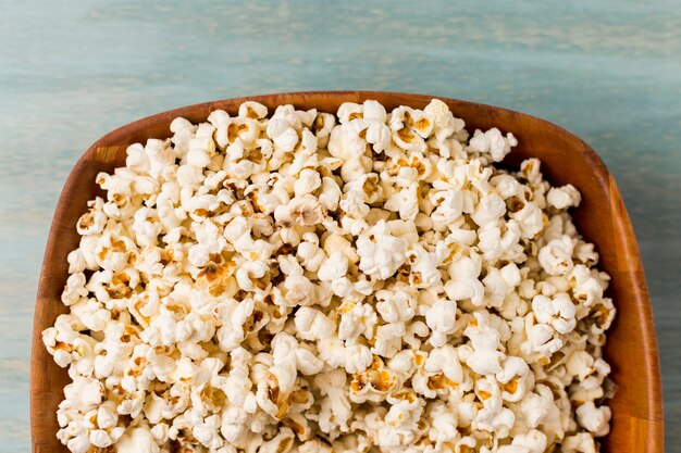 Popcorns in the wooden tray