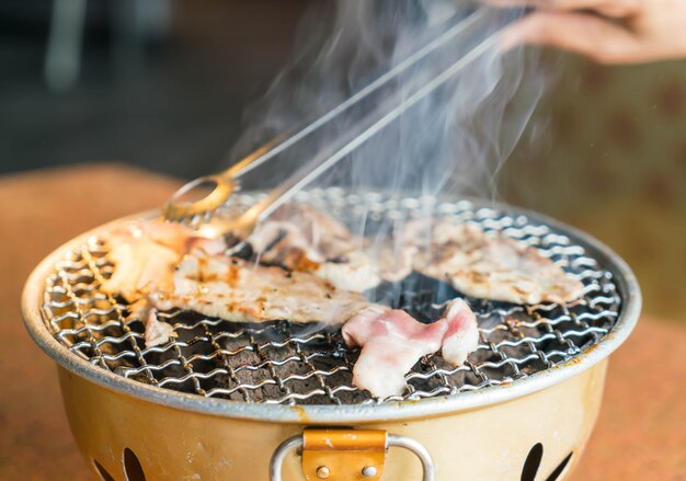 pork on charcoal grill