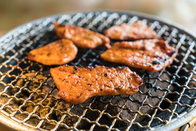 pork on charcoal grill