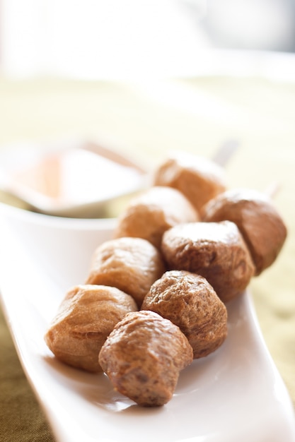 Free photo pork and meat balls, thai style appetizer on white plate