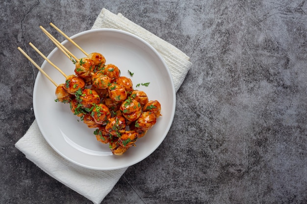 Pork meatballs on the dark surface.