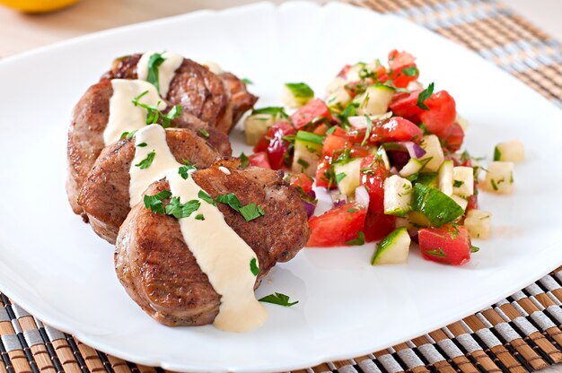 Pork medallions with salsa