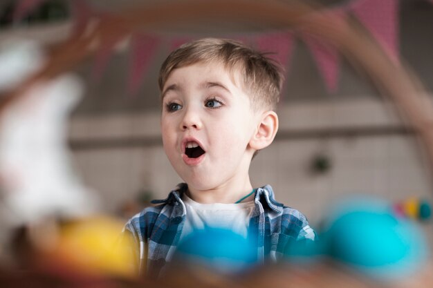 Portrait of adorable little boy surprised