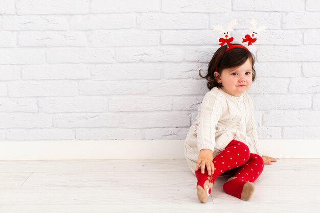 Portrait of adorable little girl looking away