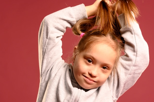 Portrait of adorable young girl posing