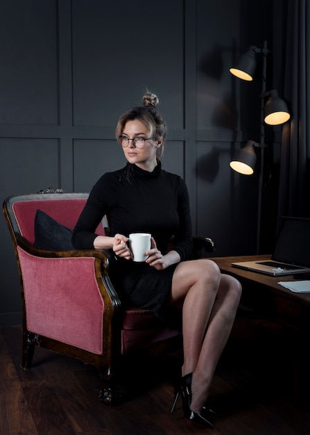 Portrait of adult businesswoman looking away