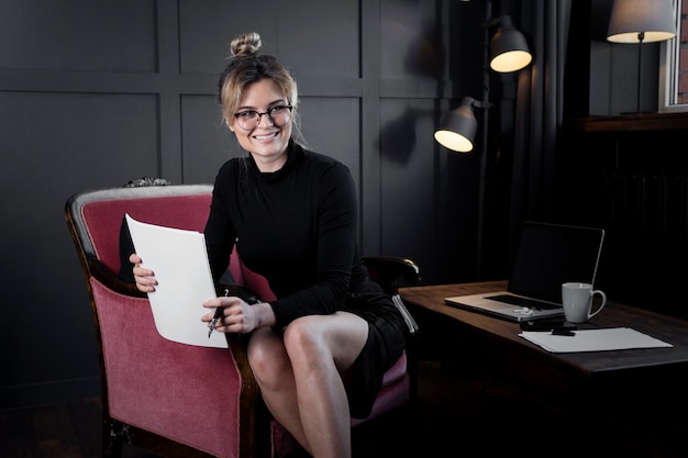 Portrait of adult businesswoman smiling