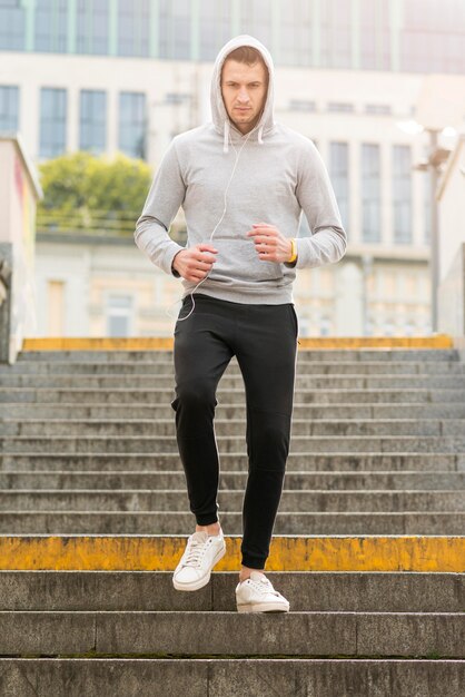 Portrait of adult male exercising outdoors