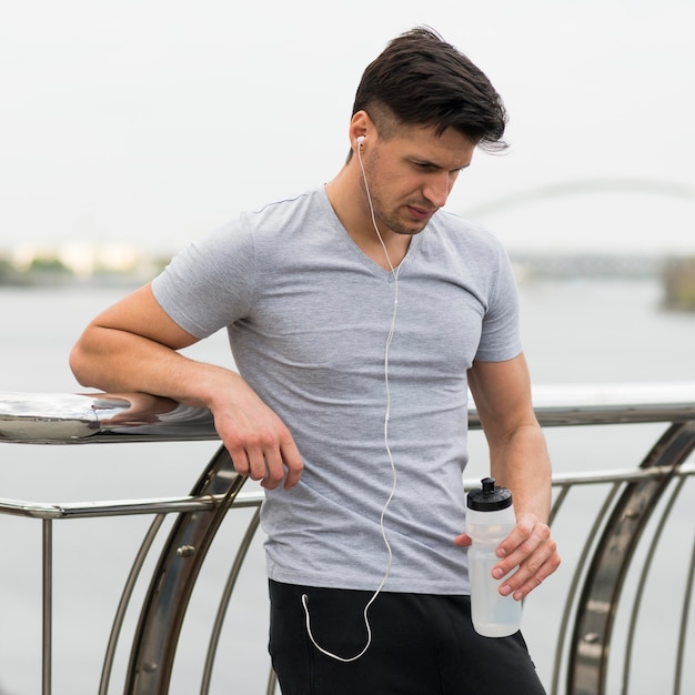 Free photo portrait of adult male getting ready to exercise