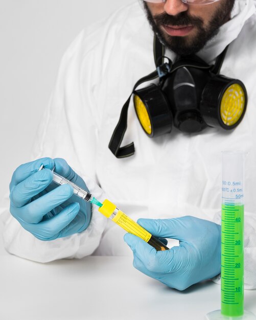 Portrait of adult male taking medical samples