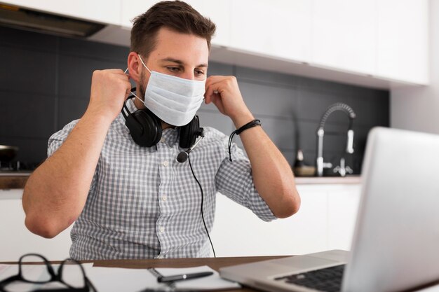 Portrait of adult male wearing face mask