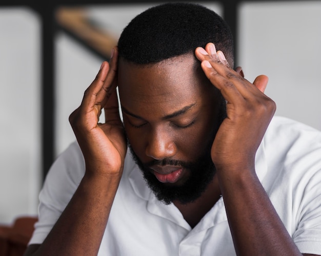 Portrait of adult male with headaches