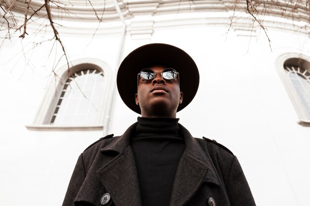 Portrait of adult male with sunglasses and hat