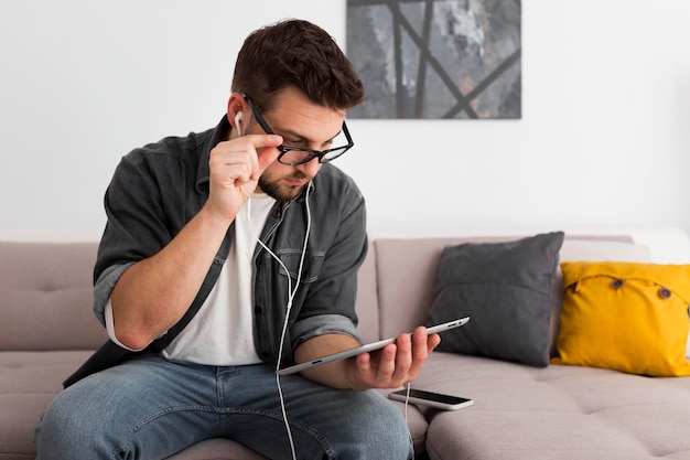 Free photo portrait of adult male working from home