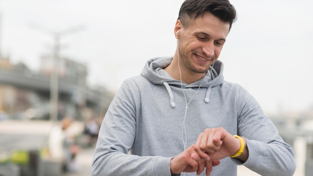 Portrait of adult man preparing for jogging