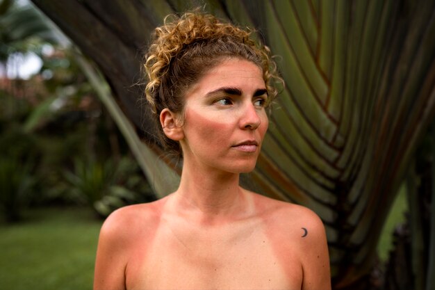 Portrait of adult woman with sunburn skin