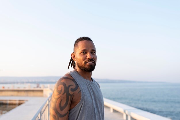 Portrait of african american athlete having a break