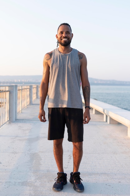 Portrait of african american athlete having a break