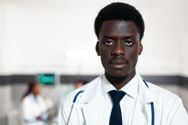 Portrait of african american doctor looking at camera