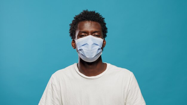 Portrait of african american man wearing face mask