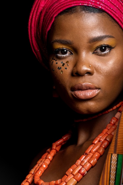 Free photo portrait of african woman wearing traditional accessories close-up