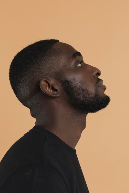 Free photo portrait of american black person looking up