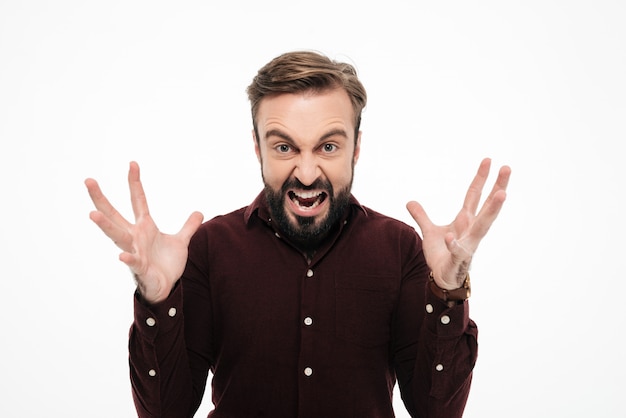 Free photo portrait of an angry furious man shouting