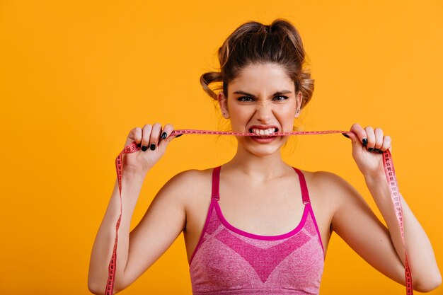 Portrait of angry woman on diet