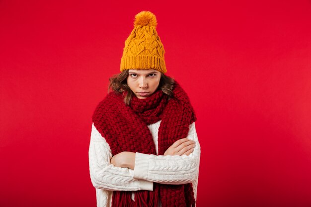 Portrait of an angry woman dressed in winter hat