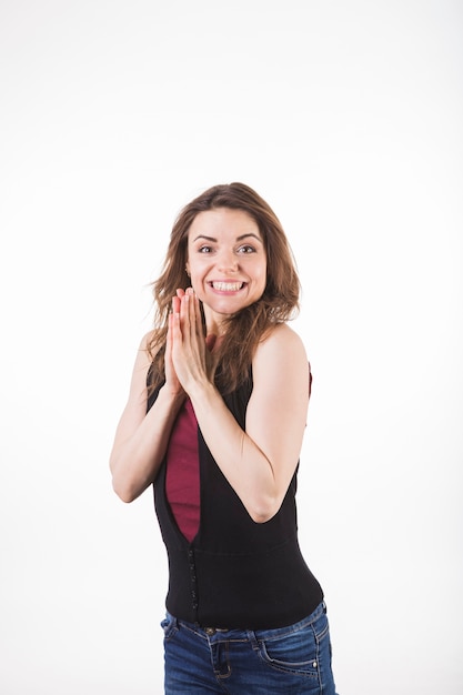 Free photo portrait of applauding beautiful smiling young woman