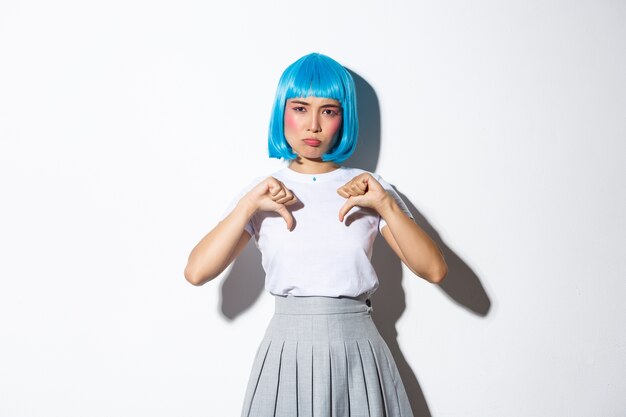 Portrait of an Asian girl in a blue short wig