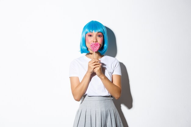 Portrait of an Asian girl in a blue short wig