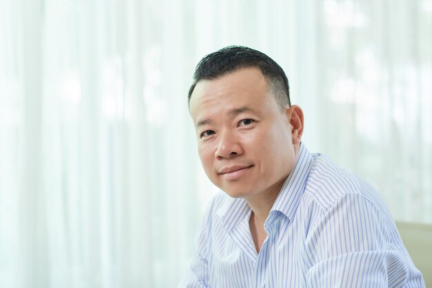 Portrait of Asian mid adult man